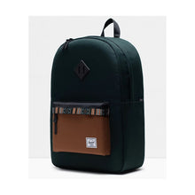 Load image into Gallery viewer, Angled front panel view of the scarab backpack. 
