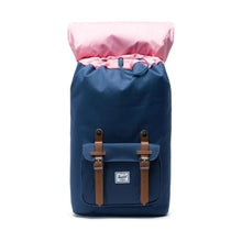 Load image into Gallery viewer, Front view of the navy blue backpack with the top flap tilted back. The interior fabric lining is pink.
