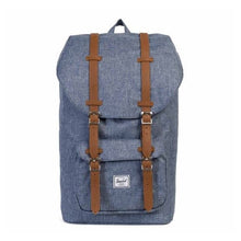 Load image into Gallery viewer, Front view of the Chambray Crosshatch backpack. 
