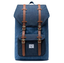 Load image into Gallery viewer, Front view of the blue denim backpack with tan leather straps.

