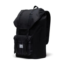 Load image into Gallery viewer, Angled front view of the black backpack with gray plaid front pocket. 
