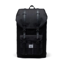 Load image into Gallery viewer, Front view of the black and plaid backpack.
