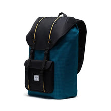 Load image into Gallery viewer, Angled front view of the Harbor Blue Grid Little America backpack. 
