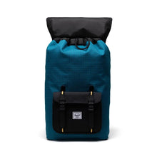 Load image into Gallery viewer, Front view of the Harbor Blue Grid Little America Backpack with the top lid flipped back. 
