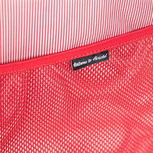 Load image into Gallery viewer, Interior close up to the red mesh pocket inside the duffle bag's main compartment.
