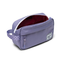 Load image into Gallery viewer, Angled view of the Daybreak Chapter Travel Kit. The main compartment is unzipped. 
