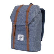 Load image into Gallery viewer, Angled front view of the Dark Chambray Crosshatch Retreat backpack. 
