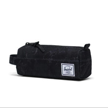 Load image into Gallery viewer, Angled front view of the Settlement pencil case in black marble. A small white Herschel logo tag is sown on the front panel.
