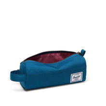 Load image into Gallery viewer, Angled top view of the Moroccan Blue Settlement Pencil case. The main compartment is unzipped. 

