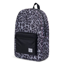 Load image into Gallery viewer, Angled view of the Snow Leopard and Black packable daypack.
