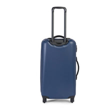 Load image into Gallery viewer, Back panel view of the navy blue Trade spinner suitcase. The telescopic handle is extended.
