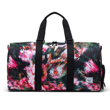 Load image into Gallery viewer, Front panel view of the Pixel Floral Novel Duffle.
