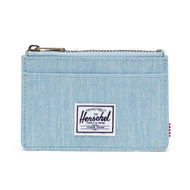 Light Denim Herschel RFID Oscar Wallet with a zippered main compartment and external card slots.