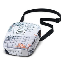 Load image into Gallery viewer, The World Travel Crossbody bag laid on its back. The adjustable shoulder strap is laid behind it.
