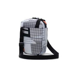 Load image into Gallery viewer, Angled back view of the World Travel Crossbody bag. 
