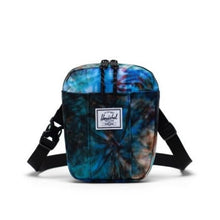 Load image into Gallery viewer, Front view of the Summer tie Dye Crossboy Cruz bag. A white Herschel logo tag is sown at the center.
