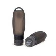Load image into Gallery viewer, Two black travel bottles, one standing straight, and one laid down, on a white background.

