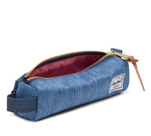 Load image into Gallery viewer, Angled view of the Faded Dark Denim Settlement case with the main compartment unzipped. 
