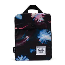 Load image into Gallery viewer, The Sunlight Floral Daypack collapsed and folded into its internal pocket.
