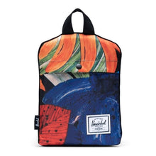 Load image into Gallery viewer, The Watercolor duffle folded into its interior pocket.
