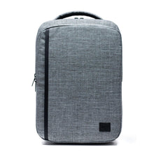 Load image into Gallery viewer, Front panel view of the Raven Crosshatch backpack. 
