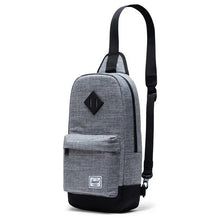 Load image into Gallery viewer, Angled front view of the raven crosshatch sling bag.
