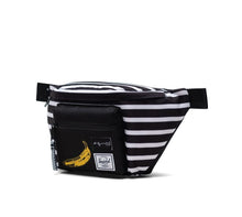 Load image into Gallery viewer, Angled front panel view of the Andy Warhol Banana Fanny Pack.
