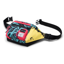 Load image into Gallery viewer, The Flowers hip pack laid on the back panel. The adjustable straps are detached.
