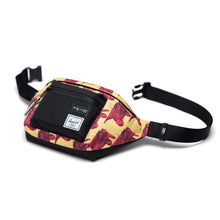 Load image into Gallery viewer, The Hip pack with Andy Warhol cows print laid on the back panel. The Adjustable straps are detached. 
