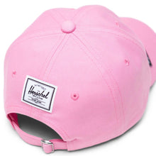 Load image into Gallery viewer, Angled back panel view of the pink Maggie Simpson Sylas cap. A white Herschel logo tag is sown.
