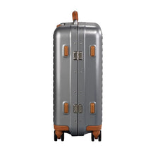 Load image into Gallery viewer, Side panel view of the suitcase. It features four stub leg to sit the suitcase on its side.
