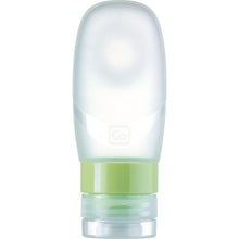 Load image into Gallery viewer, Front view of the transparent travel bottle with a lime green cap ring.
