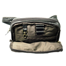 Load image into Gallery viewer, Front view of the brown leather waist pack with the front pocket opened.
