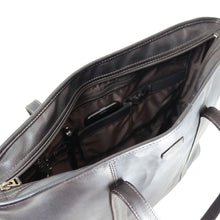 Load image into Gallery viewer, Angle interior view of the brown leather tote bag. There is a pen and a cellphone inside the organization pockets. 

