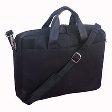 Load image into Gallery viewer, Angled front view of the black leather briefcase with the shoulder strap laid across the front.

