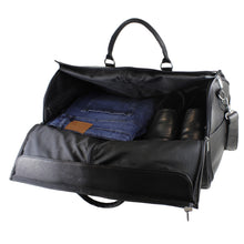Load image into Gallery viewer, Angled view of the black garment duffle bag partially opened. A pair of folded jeans and black shoes are arranged inside. 
