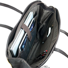 Load image into Gallery viewer, Angled top view of the brown leather bag. A laptop, tablet, three pens, and a cellphone are organized in the dedicated compartments. 
