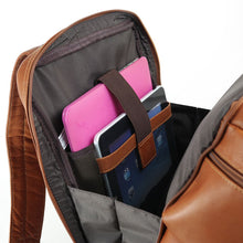 Load image into Gallery viewer, Interior view of the laptop compartment. A laptop and tablet are secured in the dedicated pockets. 
