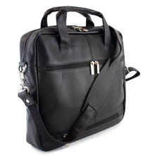 Load image into Gallery viewer, Angle back panel view of the black leather brief. The removable shoulder strap is resting across the front. 
