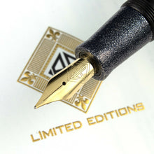 Load image into Gallery viewer, Close up to the fountain pen nib. It features an engraving of the AP Limited Editions logo and an M for the nib point size.
