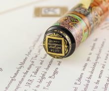 Load image into Gallery viewer, Close up to the artist signature painted at the bottom of the pen. 
