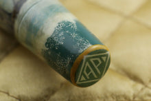 Load image into Gallery viewer, Close up to the AP log painted at the bottom of the barrel. 
