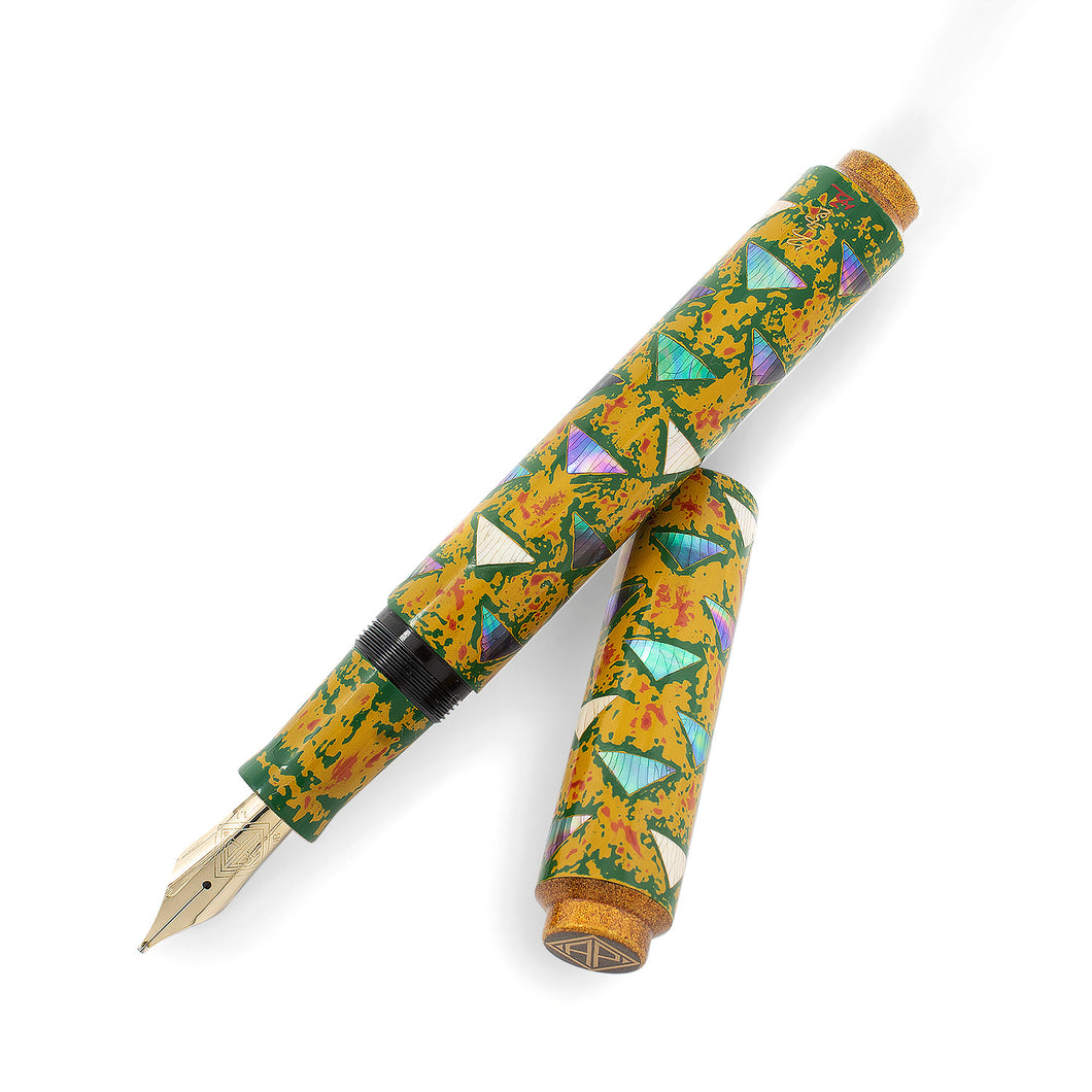 On a white background: The Tantalizing Triangles Fountain Pen with the cap set to the side. It is a yellow fountain pen with 