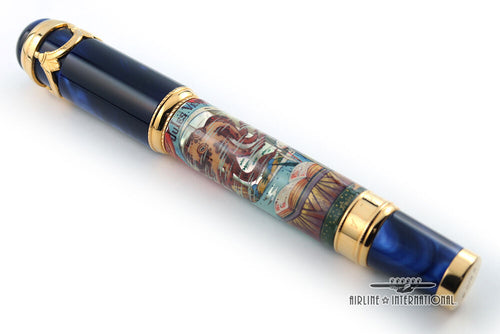 Back view of the Fountain Pen set on a white background. The cap and bottom of the barrel are made of blue marbled resin, with gold-plated trims. The barrel features a hand-painted scenes of the 20000 Leagues Under the Sea story.