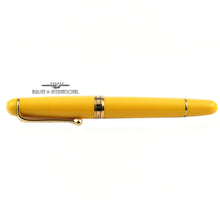 Load image into Gallery viewer, Side view of the fountain pen on a white background. 
