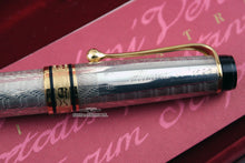 Load image into Gallery viewer, Close up to side of the cap. It has an engraving in cursive of the word Aurura, N. 1590, and the .925 Silver hallmarks.
