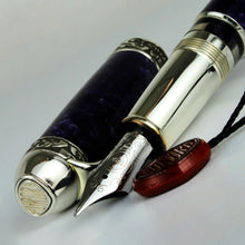 Load image into Gallery viewer, Close up to the Fountain Pen nib with the cap placed to the side. 
