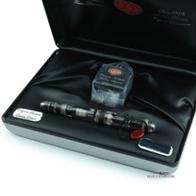 Load image into Gallery viewer, Close up to the Fountain Pen on the presentation box with the included ink box. Placed on a white background.
