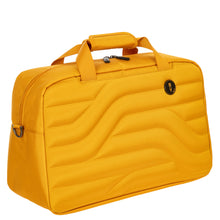 Load image into Gallery viewer, Front angled view of the mango yellow 18 inch duffle bag. Set on a white background. 
