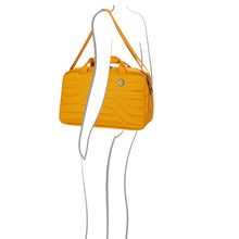 Load image into Gallery viewer, The bag being held by a drawn model. 
